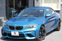 BMW Mシリーズ M2ｸｰﾍﾟMDCT 370馬力 直6ﾀｰﾎﾞ7速DCT ﾋｰﾀｰ黒革 HDDﾅﾋﾞBｶﾒﾗ 専用19AW 専用ﾌﾞﾚｰｷ 衝突軽減ﾌﾞﾚｰｷ 車線逸脱警告 歩行者警告 ﾌﾞﾚｰｷ付ｸﾙｺﾝ ｽﾏｰﾄｷｰ ｶｰﾎﾞﾝｲﾝﾃﾘｱﾄﾘﾑ ﾊﾟﾄﾞﾙｼﾌﾄ 2年保証